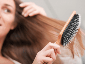 Is it normal to experience postpartum hair loss after giving birth?